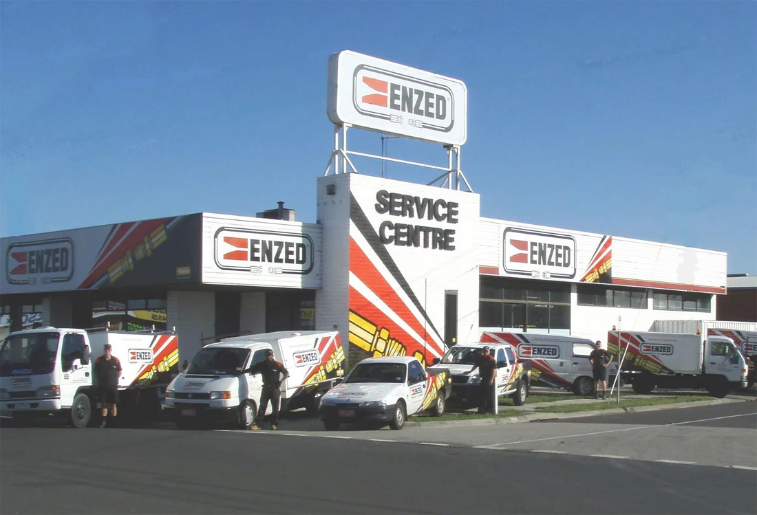 ENZED HOSE DOCTOR beside a service truck
